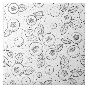 Blueberries on black and white tile