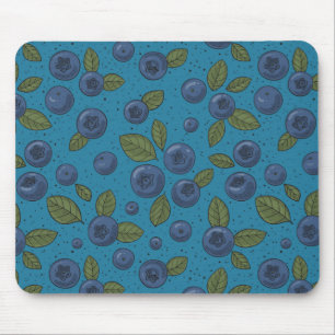 Blueberries on blue mouse mat