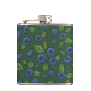 Blueberries on dark green hip flask