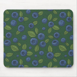 Blueberries on dark green mouse mat