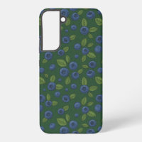 Blueberries on dark green