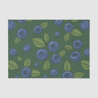 Blueberries on dark green tissue paper