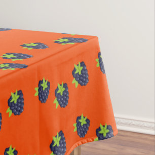 Blueberry fruit pattern on orange tablecloth