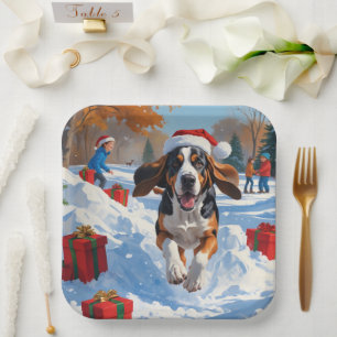Bluetick Coonhound Running in Snow with Christmas Paper Plate