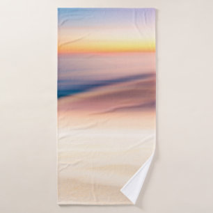 Blur tropical sunset beach with bokeh sun light wa bath towel