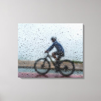 Blurred Cyclist Through Rainy Window Canvas Print