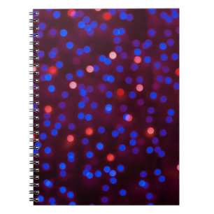 Blurred glittering christmas lights. Blurred abstr Notebook