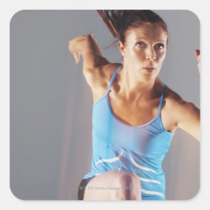 Blurred view of athlete running with baton square sticker