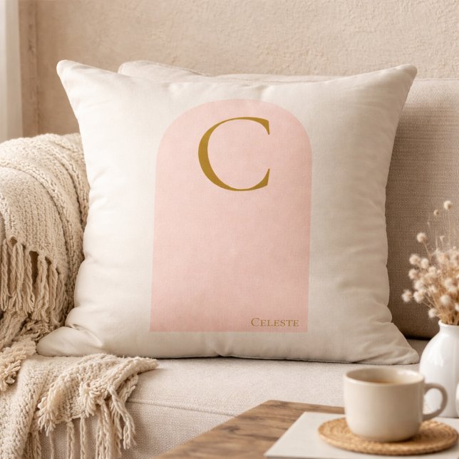 Blush Arch Monogram Throw Pillow (Soft ivory meets blush arch detail, finished with a gold serif monogram for refined neutral living.)