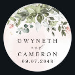 Blush Gold Greenery Succulent Dusty Blue Wedding Classic Round Sticker<br><div class="desc">Design features light or blush pink watercolor splashes with printed gold simulated flecks. Design also features blush pink rose floral elements within a greenery bouquet or wreath. The wreath contains a succulent, eucalyptus and other greenery elements in shades of dark emerald green, sage green, dusty blue and more to fit...</div>