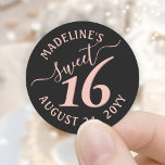 Blush Pink Black Sweet 16th Birthday Party Favour Classic Round Sticker<br><div class="desc">Add a chic and stylish finishing touch to envelopes and favours with these pink and black sweet 16th birthday party round stickers. Design features a girly blush pink hand written style script typography on a modern black background. Text in a circle is simple to customise. These elegant labels make a...</div>