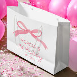 Blush Pink Bow Birthday Party Cute Name Large Gift Bag<br><div class="desc">Add a charming touch to your celebration with the Blush Pink Bow Birthday Party Cute Name Large Gift Bag. This delightful bag features a soft blush pink colour adorned with a sweet watercolor bow design, perfect for a girly birthday party. Personalise it with a name to make each gift extra...</div>