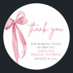 Blush Pink Bow She's Tying the Knot Bridal Shower Classic Round Sticker<br><div class="desc">This charming bridal shower theme exudes elegance and romance with its delicate blush pink hues and intricate bow details. It's perfect for celebrating the bride-to-be as she embarks on the journey of tying the knot. From the invitations to the decorations, every aspect of this theme radiates sophistication and joy. Embrace...</div>