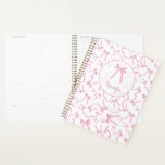 Blush pink coquette ribbon pattern personalised planner<br><div class="desc">Stay organised in style with the Blush Pink Coquette Ribbon Pattern Personalised Planner! Featuring a charming ribbon design and customisable text,  this elegant planner is perfect for adding a touch of femininity and sophistication to your daily planning routine.</div>