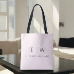 Blush Pink Elegant Modern Minimalist Monogram Name Tote Bag<br><div class="desc">Elevate your style with our Classic Elegant Modern Minimalist Monogram Tote Bag. This versatile tote seamlessly blends timeless sophistication with contemporary minimalism, making it an essential accessory for any occasion. Designed with meticulous attention to detail, this tote bag is more than just a practical accessory; it's a personalised fashion statement....</div>
