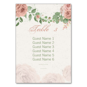 blush pink flowers sage green leaves seating chart table number