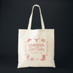 Blush Pink Last Rodeo Cowgirl Bachelorette Party Tote Bag<br><div class="desc">This Blush Pink Last Rodeo Cowgirl Bachelorette Party Tote Bag features a hand drawn layout with hand drawn illustrations along with a western font! You have freedom to create something uniquely yours! Easily edit wording and colours to match your style! Text and background colours are fully editable >>>click the "Edit...</div>