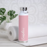 Blush Pink Personalised Wedding Bridesmaid Water Bottle<br><div class="desc">Gift your wedding bridesmaid or maid of honour with this trendy, vacuum Insulated water bottle that features her name in white, stylised script on a blush pink colour background designed to match your wedding colour scheme. Personalise bottle by editing and replacing name with your own as desired. Select your water...</div>