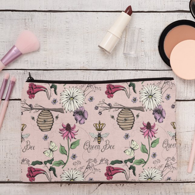 Blush Pink Queen Bee & Gold Crown Accessory Pouch (Chic and Trendy Queen Bee & Exotic Flowers Makeup or Accessory Pouch on an Elegant Ivory Background.)