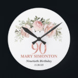 Blush Pink Rose Gold Floral 90th Birthday Round Clock<br><div class="desc">Unique gift idea for a 90th birthday celebration. A pretty and feminine spray of blush pink roses sits at the top of the design. 90 is written just below in a rose gold metallic graphic. Her name and two lines of text let you customise your gift.</div>