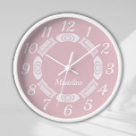 Blush Pink Script Monogram Girly Name Clock<br><div class="desc">This cute and girly clock features an abstract swirl pattern from a fluid art piece I created with a blush pink background with easily readable numbers in white. This modern design also features a place for you to add your girl's name. The perfect pink whimsical design for your little one's...</div>