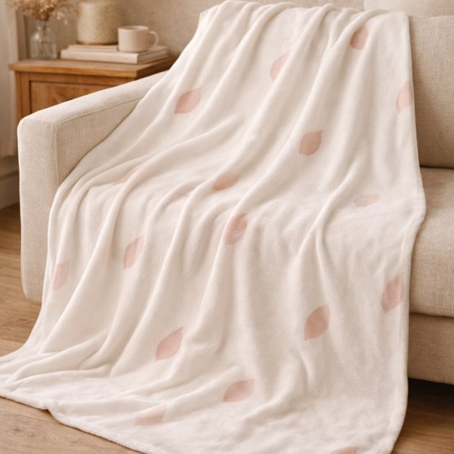 Blush Whisper Petals Fleece Blanket (Blush petal washes across an ivory backdrop add gentle pattern to modern feminine interiors.)