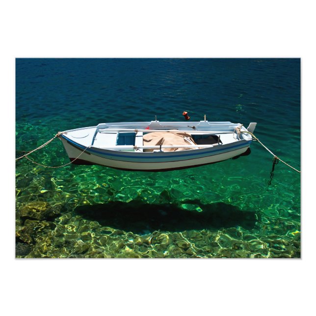 Boat floating on crystal clear water. photo print (Front)