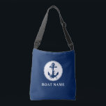 Boat Name Nautical Anchor Rope Navy Blue Crossbody Bag<br><div class="desc">A navy blue crossbody tote bag with your personalised name, boat name or other desired text. Features a custom designed nautical anchor and rope. Easily customise the base colour to match your current theme or decor. Great for vacation, shopping and travelling. The perfect personalised gift for any occasion.</div>