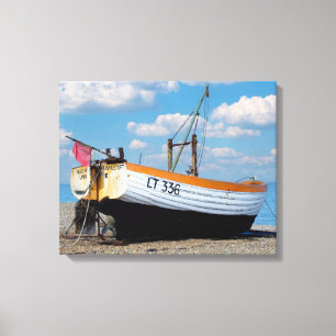 Boat on the beach canvas print