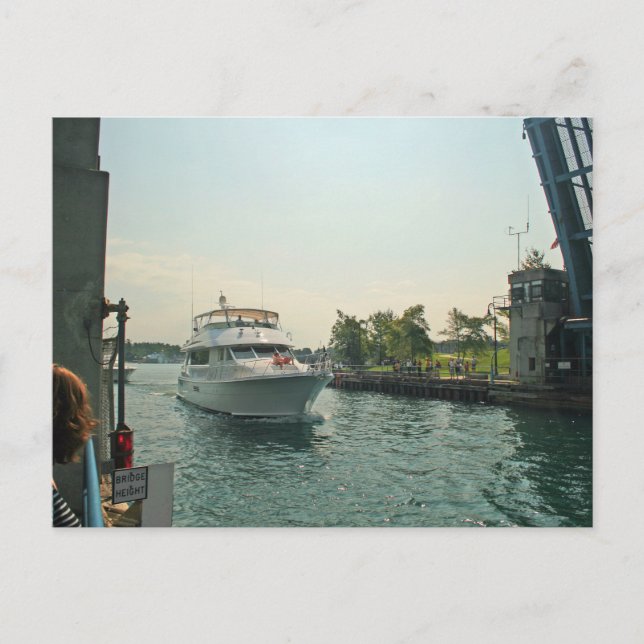 Boat Under a Drawbridge, Charlevoix, Michigan Postcard (Front)