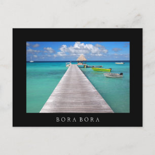 Boats at a jetty in Bora Bora black text postcard