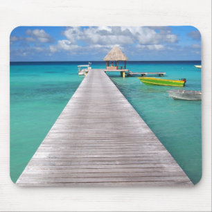 Boats at a jetty in the Pacific mousepad