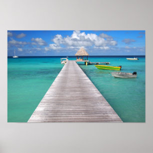 Boats at a jetty in the Pacific Poster