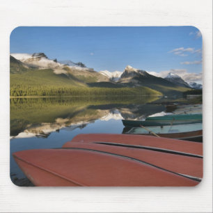 Boats parked on the lakeshore of Maligne Lake, Mouse Mat
