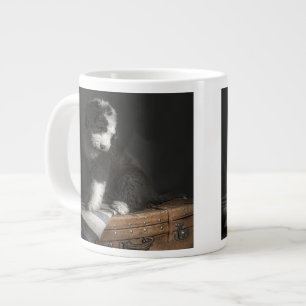 Bobtail puppy portrait in studio large coffee mug