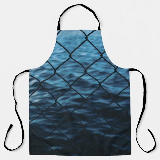 Body of water in front of chain link fence apron (Front)