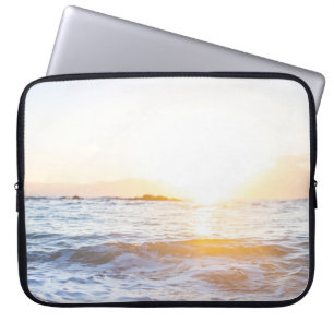 Body of water under sunset laptop sleeve