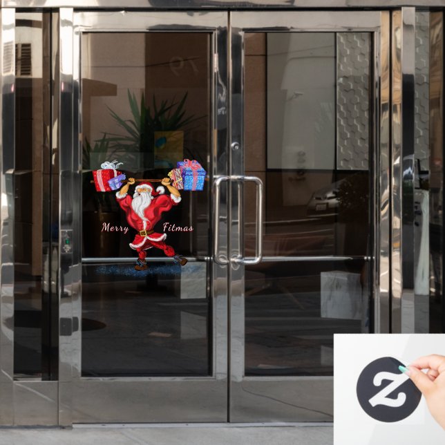 Bodybuilder Santa Claus with Christmas Gifts Funny Window Cling (Office Door)