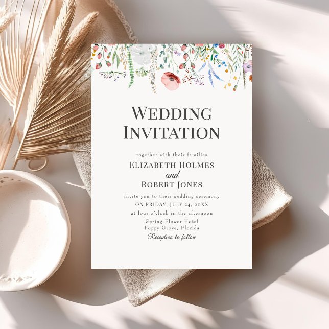 Bohemian Watercolor Wildflower Wedding Invitation (Bohemian Watercolor Wildflower Wedding Invitation on a neutral boho wedding table.)