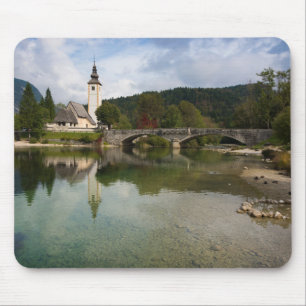 Bohinj lake with church in Slovenia mousepad