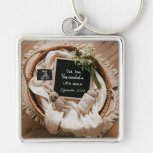 Boho basket pregnancy announcement keepsake key ring