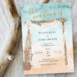 Boho Beach Arbor Watercolor Ocean Wedding Invitation<br><div class="desc">Boho beach wedding invitation with rustic arbor, elegant gold calligraphy and watercolor ocean shoreline. This beautiful design has a sandy beach, bohemian chic style wedding arch decorated with voile and eucalyptus with a basket of pampas grass and tropical flowers. "the wedding of" is hand lettered and the template is ready...</div>