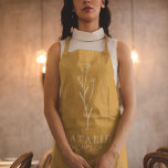 Boho Chic Personalised Monogram Mustard Yellow Apron<br><div class="desc">Introducing our Boho Chic Personalised Monogram Mustard Yellow Apron, a perfect blend of modern minimalism and sophisticated style. Crafted with a neutral mustard yellow fabric, this apron embodies a trendy yet timeless aesthetic, ideal for both home cooks and professional stylists. The modern minimalist design features clean, simple lines and trendy...</div>