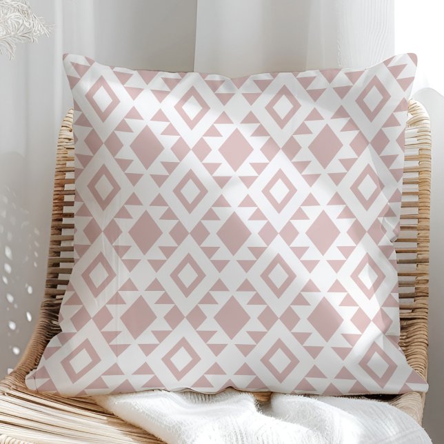 Boho Dusty Rose and White Navajo Cushion (Boho Dusty Rose and White Navajo Throw Pillow in a sunny rattan armchair.)