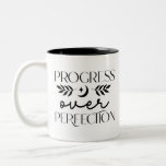 Boho Progress Over Perfection Inspirational Two-Tone Coffee Mug<br><div class="desc">Embrace the journey and celebrate small victories with the "Boho Progress Over Perfection Inspirational Two-Tone Coffee Mug." This elegant mug features a motivational message, "Progress Over Perfection, " set in a stylish boho-inspired font. The black and white colour scheme adds a modern, minimalist touch, perfect for those who appreciate chic...</div>