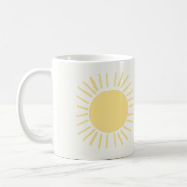 Boho sun design in yellow coffee mug (Left)