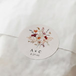 Boho Wildflower Fall Burgundy Rust Wedding Classic Round Sticker<br><div class="desc">Add a touch of bohemian charm and the enchanting beauty of fall to your wedding stationery with our Boho Fall Wildflower Wedding Stickers or Seals. These delightful stickers are designed to elevate your invitations, envelopes, favours, and more, with a rustic yet elegant twist. Featuring a captivating assortment of fall wildflowers,...</div>