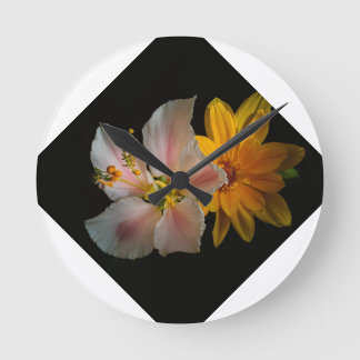 Bold Elegance: Black Flower Pillow" Round Clock