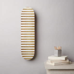 Bold gold glitter and white stripes skateboard