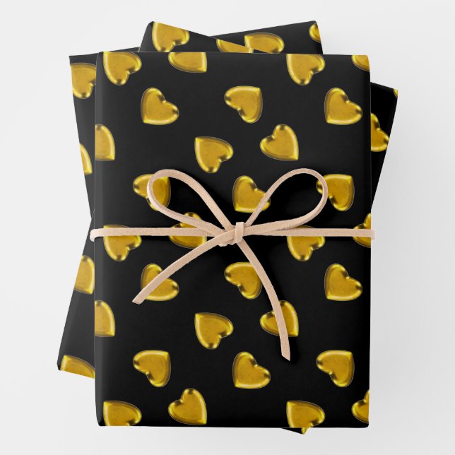 Bold gold hearts pattern black wrapping paper sheet (In situ)